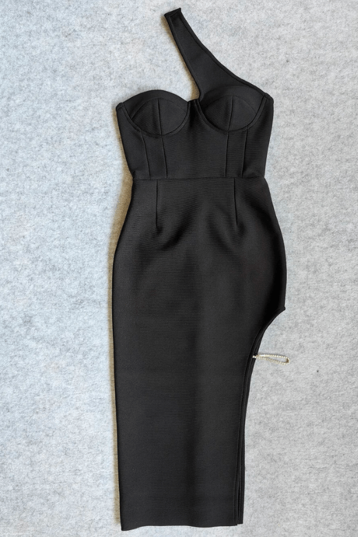 Woman wearing a figure flattering  Cairo Bandage Midi Dress - Classic Black BODYCON COLLECTION