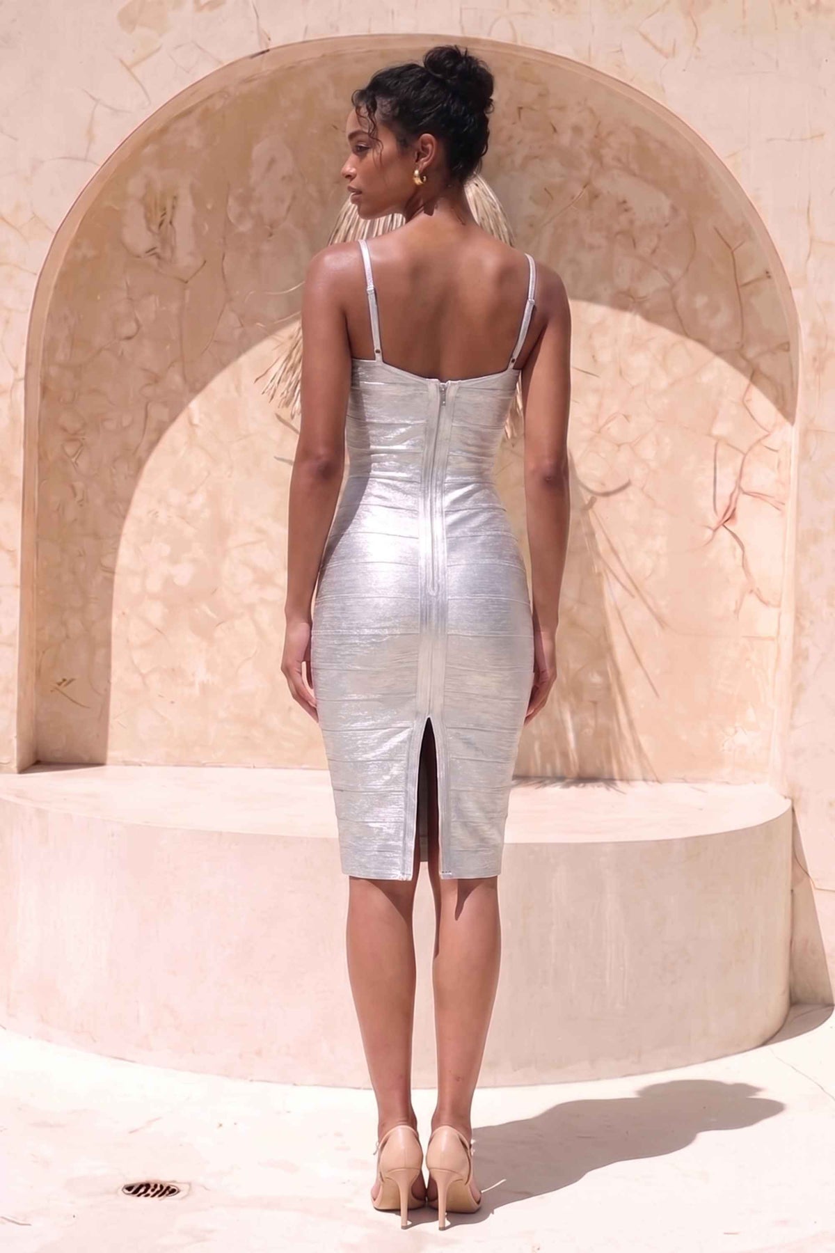 Woman wearing a figure flattering  Camila Bandage Dress - Silver BODYCON COLLECTION Pty Ltd