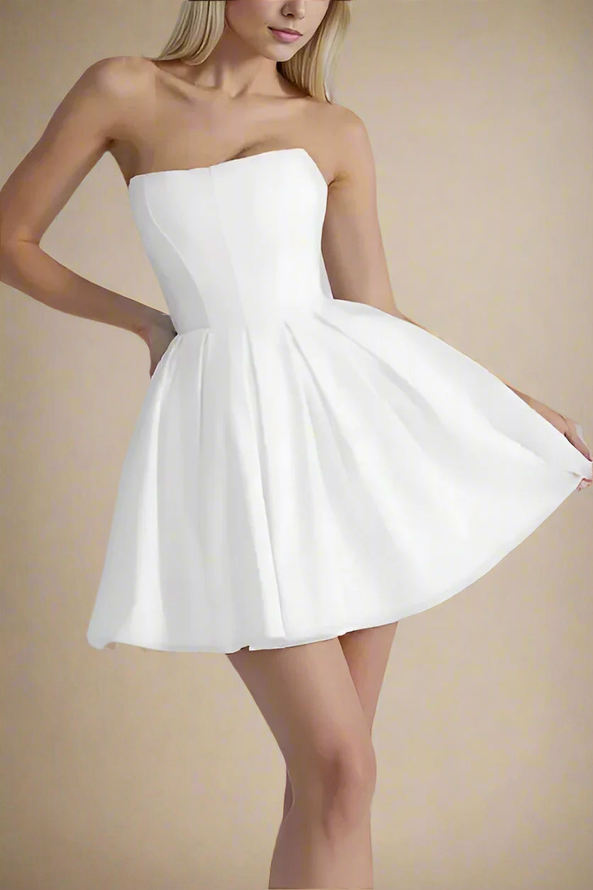 Woman wearing a figure flattering  Capri Bodycon Strapless Mini Dress - Pearl White BODYCON COLLECTION