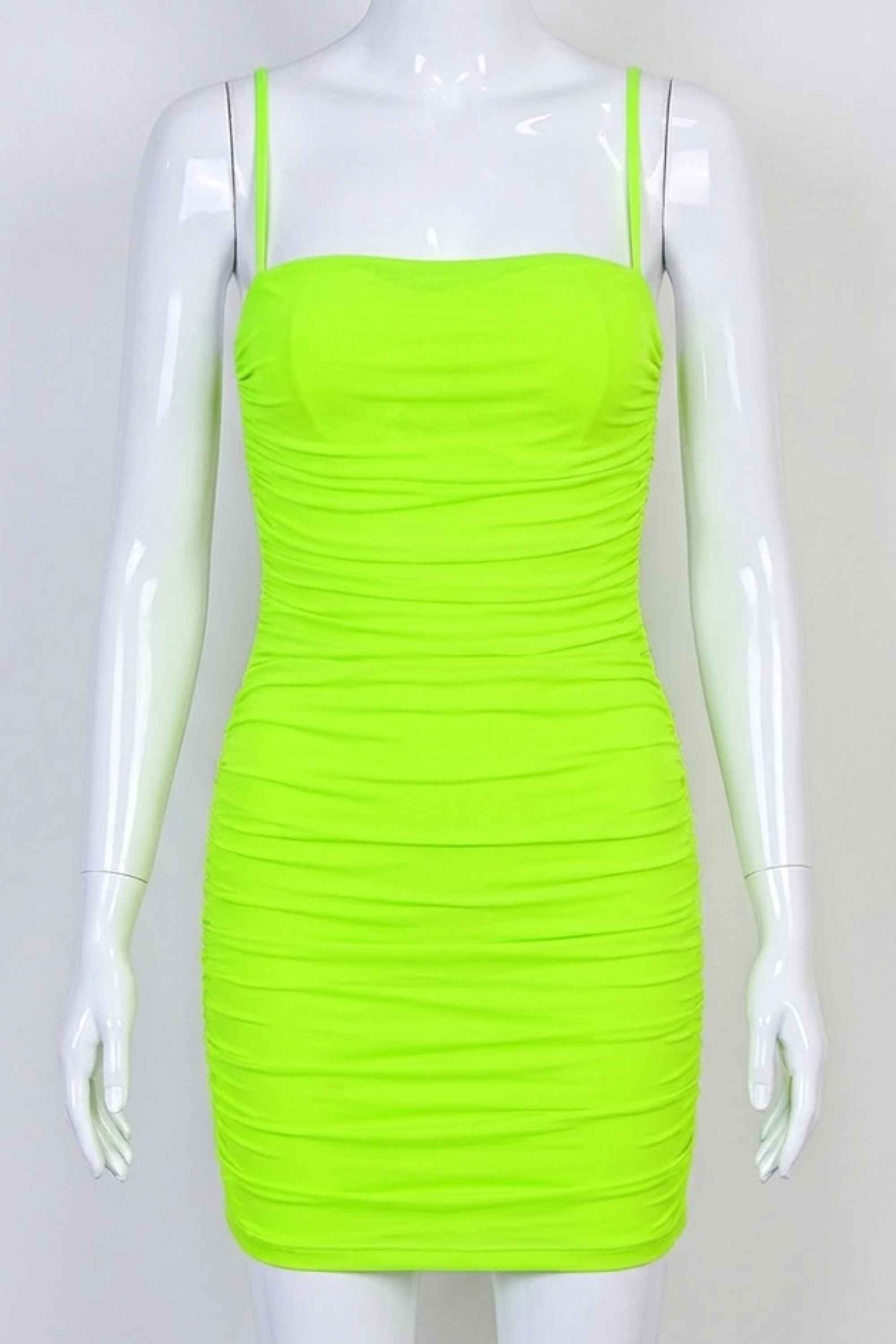 Woman wearing a figure flattering  Cassie Bodycon Wrap Mini Dress - Neon Green BODYCON COLLECTION