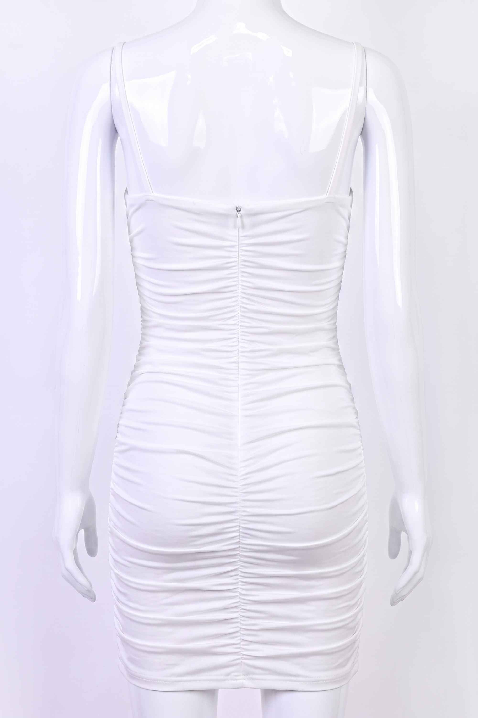 Woman wearing a figure flattering  Cassie Bodycon Wrap Mini Dress - Pearl White BODYCON COLLECTION