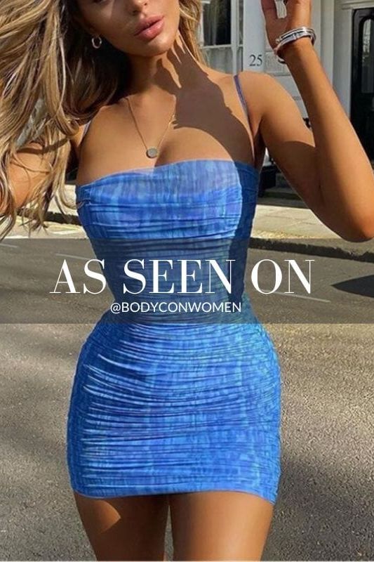 Woman wearing a figure flattering  Cassie Bodycon Wrap Mini Dress - Royal Blue BODYCON COLLECTION