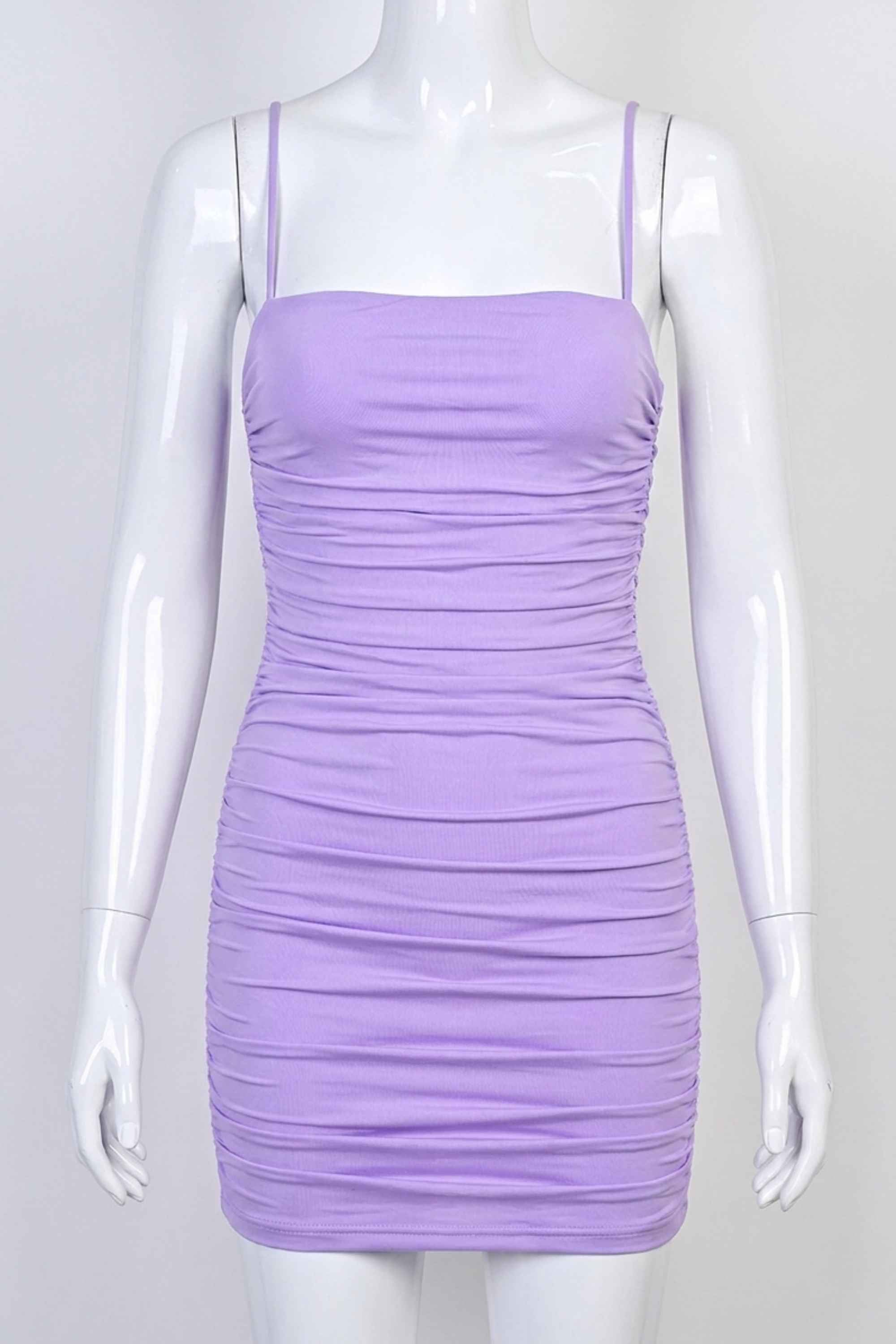 Woman wearing a figure flattering  Cassie Bodycon Wrap Mini Dress - Violet BODYCON COLLECTION