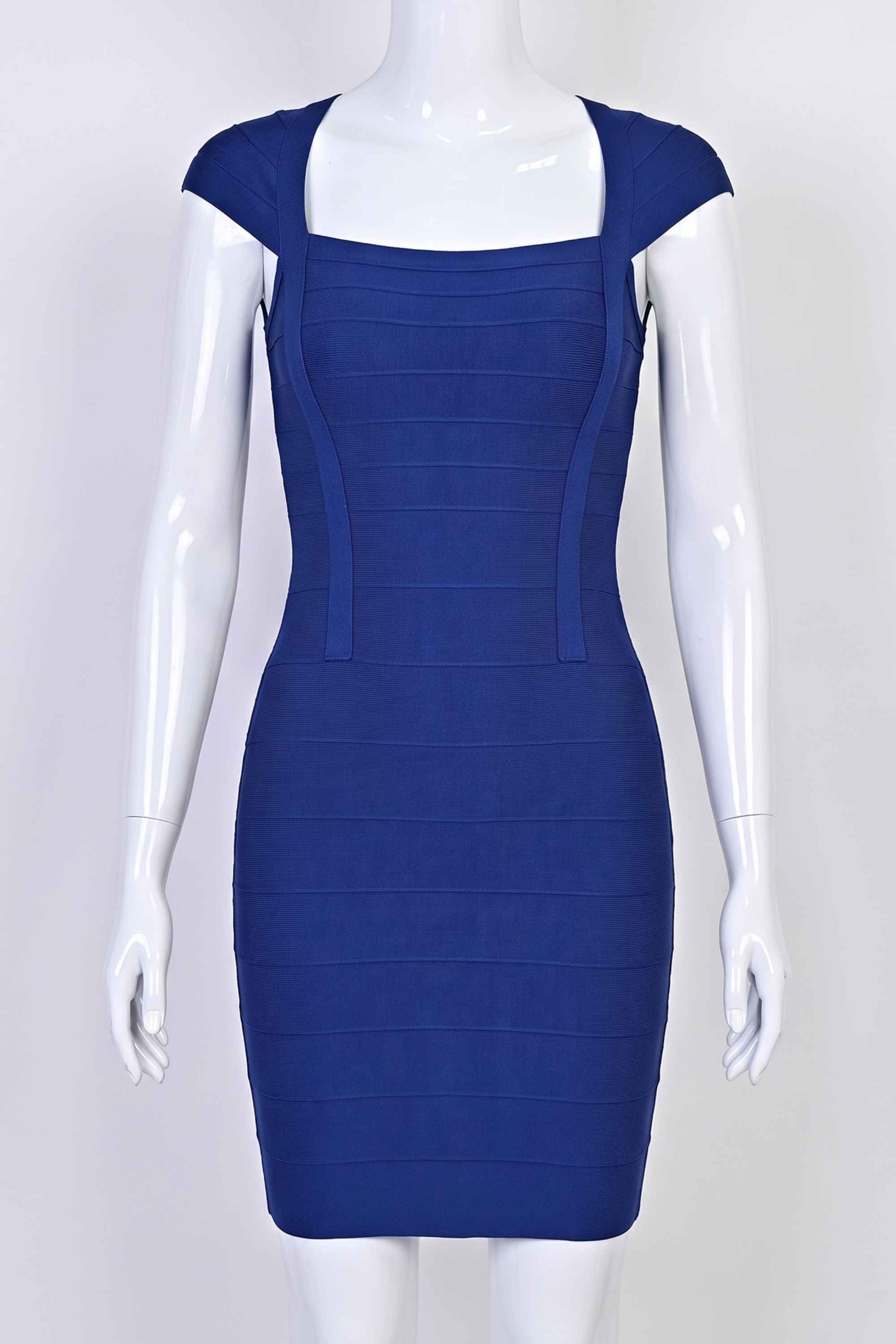 Woman wearing a figure flattering  Celine Bandage Mini Dress - Navy Blue BODYCON COLLECTION Pty Ltd