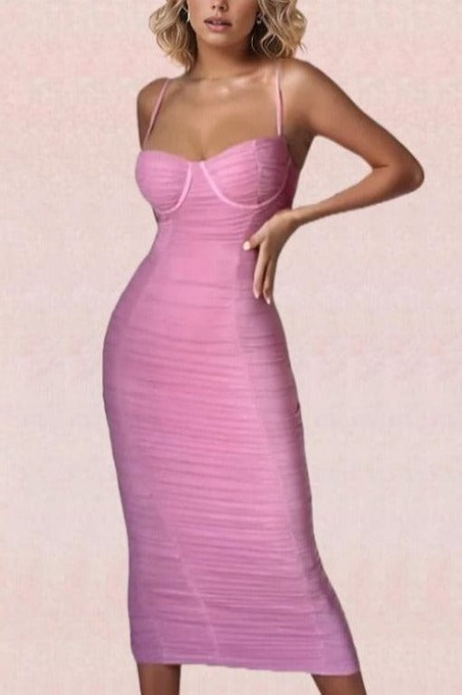 Woman wearing a figure flattering  Chance Bodycon Wrap Midi Dress - Blush Pink BODYCON COLLECTION