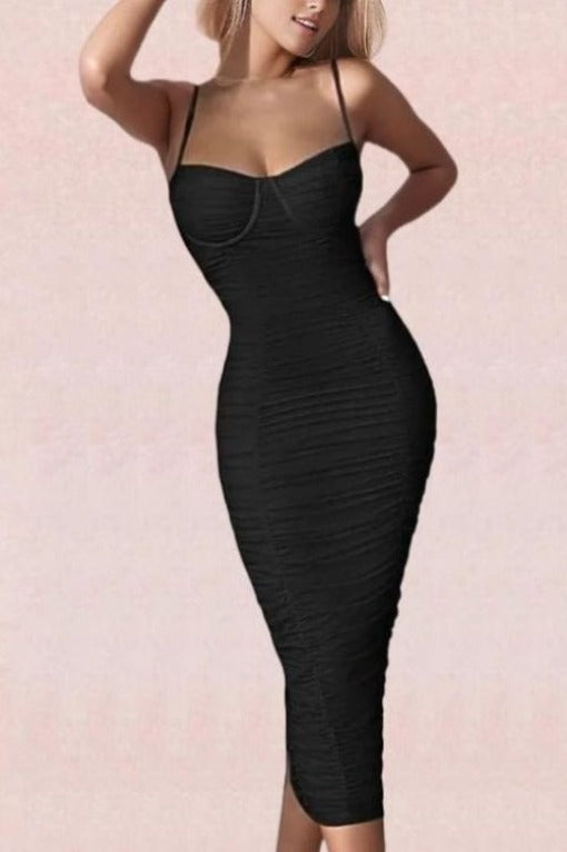Woman wearing a figure flattering  Chance Bodycon Wrap Midi Dress - Classic Black BODYCON COLLECTION