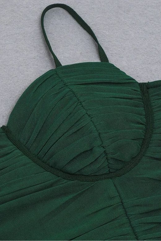 Woman wearing a figure flattering  Chance Bodycon Wrap Midi Dress - Emerald Green BODYCON COLLECTION