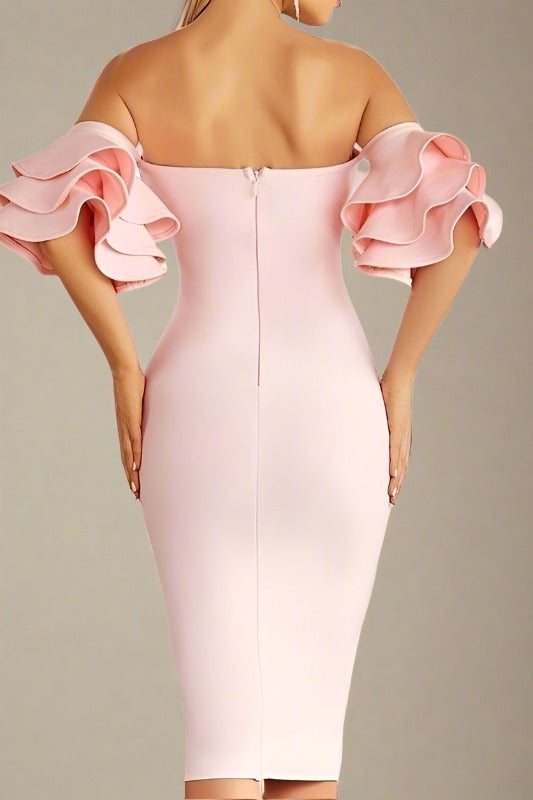 Woman wearing a figure flattering  Charlie Bandage Dress - Dusty Pink BODYCON COLLECTION