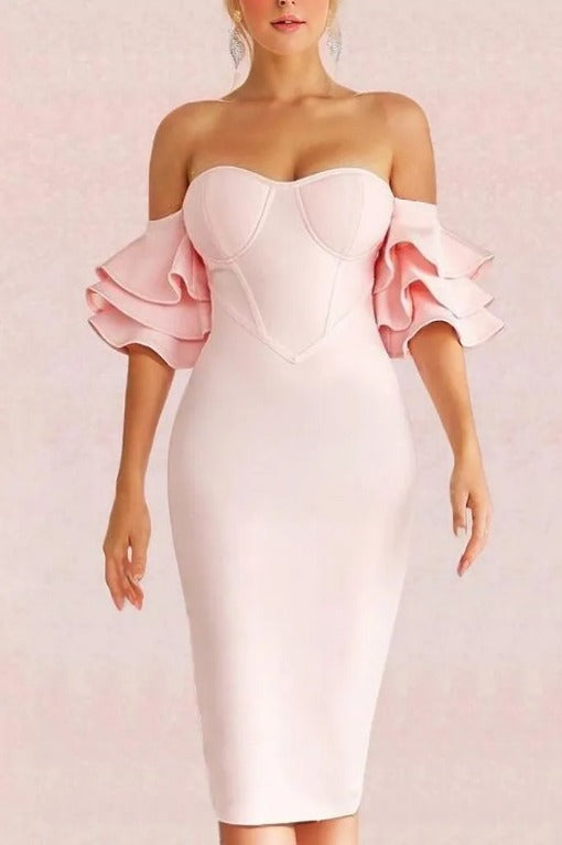 Woman wearing a figure flattering  Charlie Bandage Dress - Dusty Pink BODYCON COLLECTION