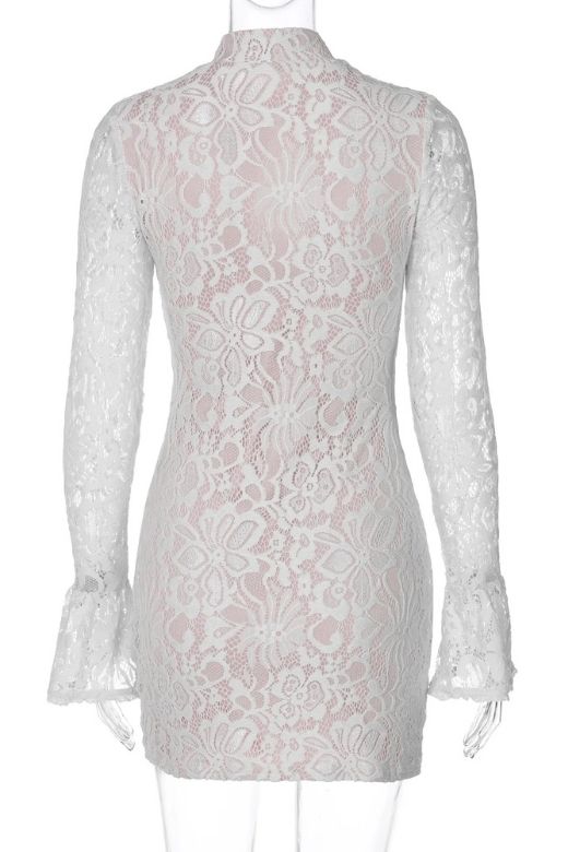 Woman wearing a figure flattering  Charlotte Long Sleeve Bodycon Mini Dress - White Pearl BODYCON COLLECTION