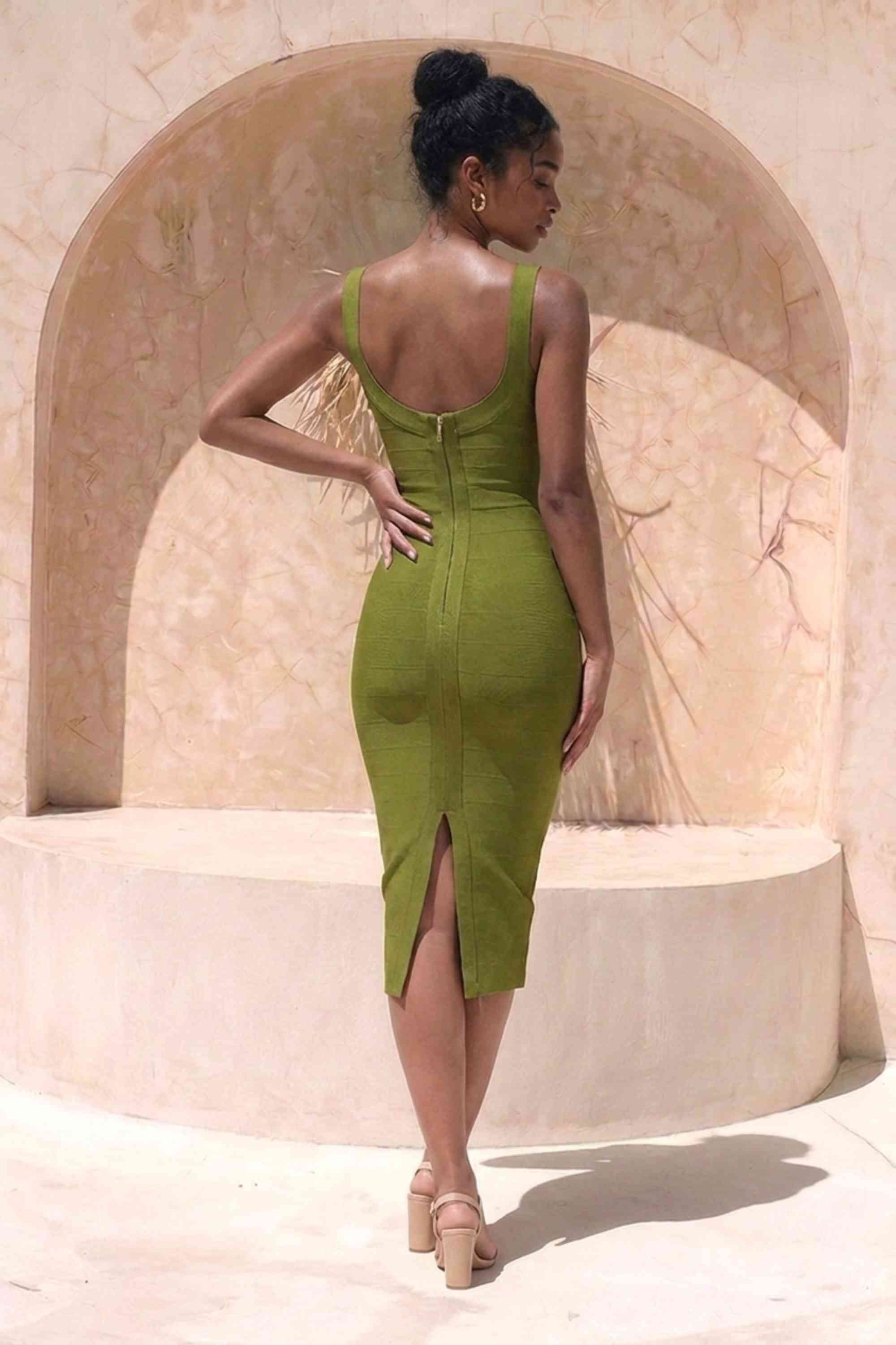 Woman wearing a figure flattering  Cindy Bandage Midi Dress - Army Green BODYCON COLLECTION Pty Ltd