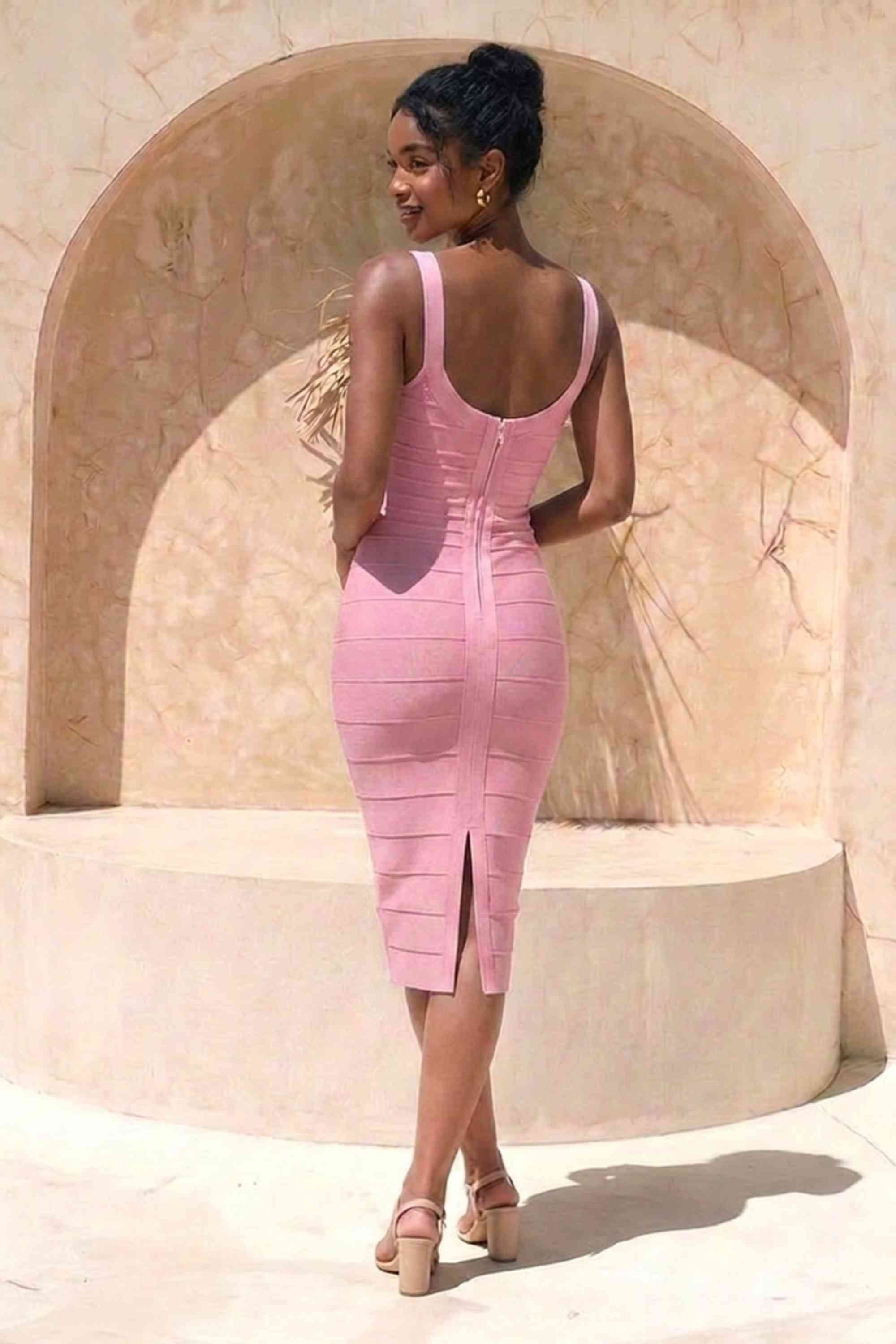 Woman wearing a figure flattering  Cindy Bandage Midi Dress - Blush Pink BODYCON COLLECTION Pty Ltd