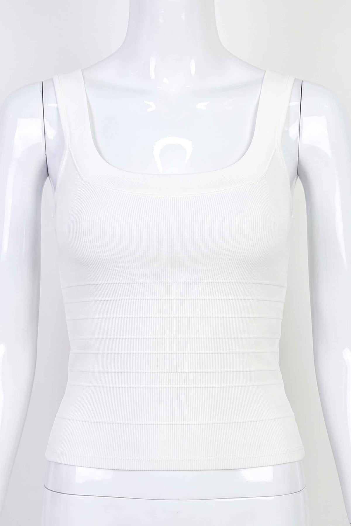 Woman wearing a figure flattering  Cindy Bandage Top - Pearl White BODYCON COLLECTION Pty Ltd