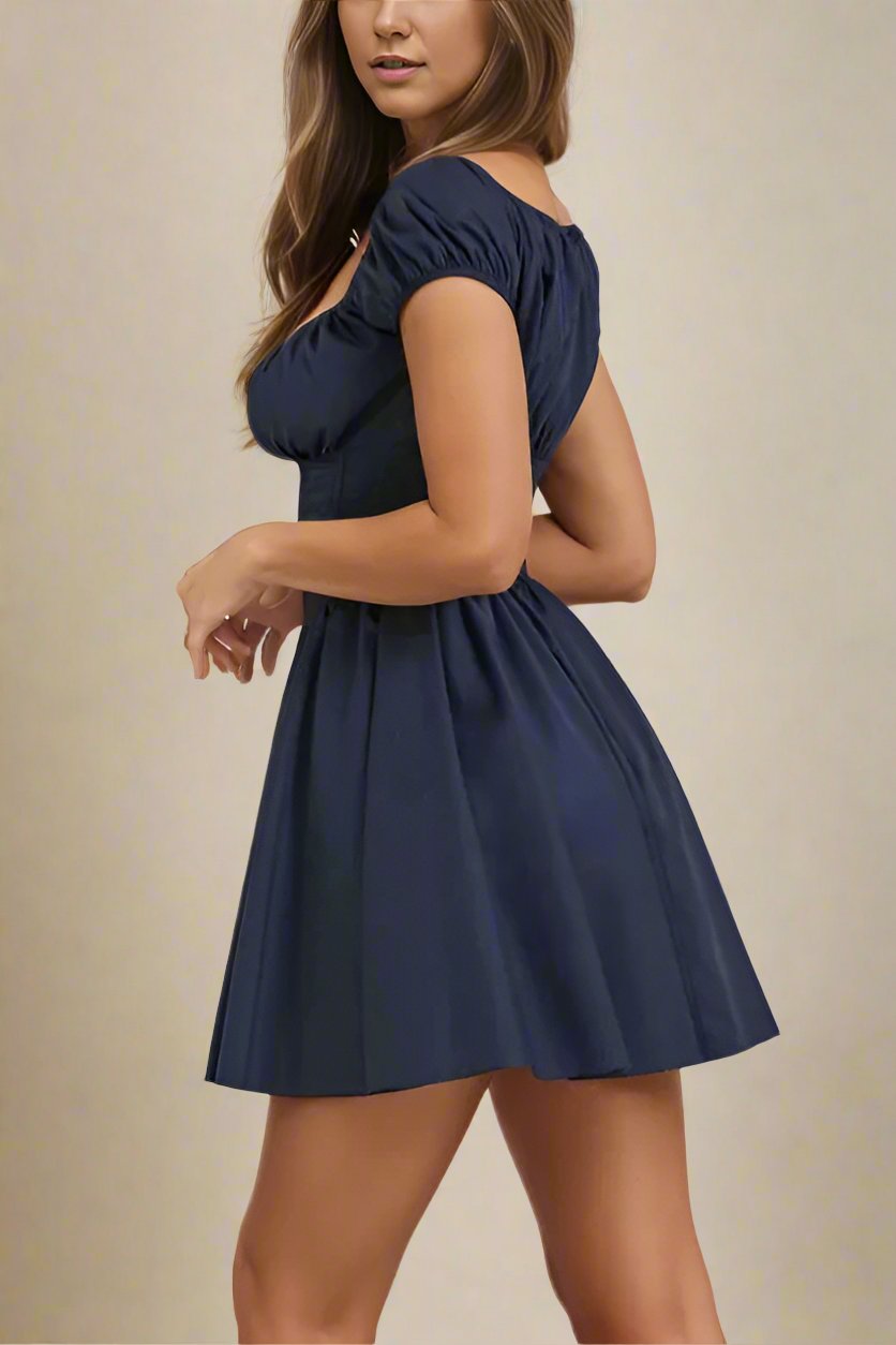 Woman wearing a figure flattering  Corey Bodycon Mini Dress - Navy Blue BODYCON COLLECTION