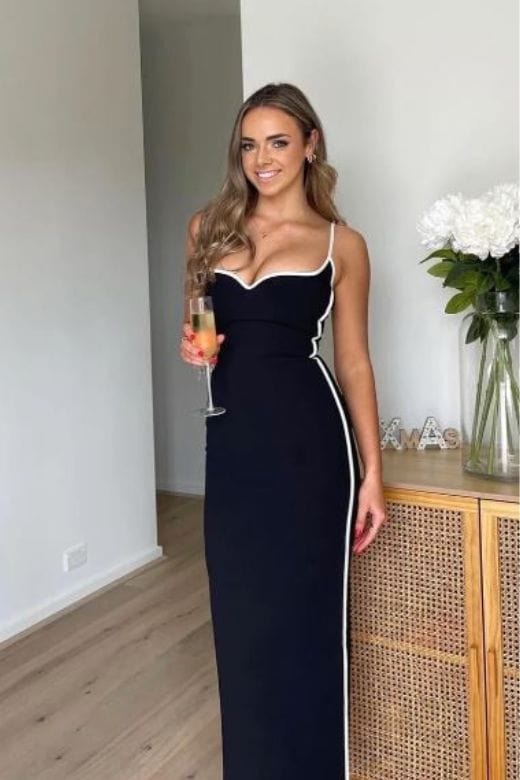 Woman wearing a figure flattering  Dianne Bandage Maxi Dress - Classic Black BODYCON COLLECTION