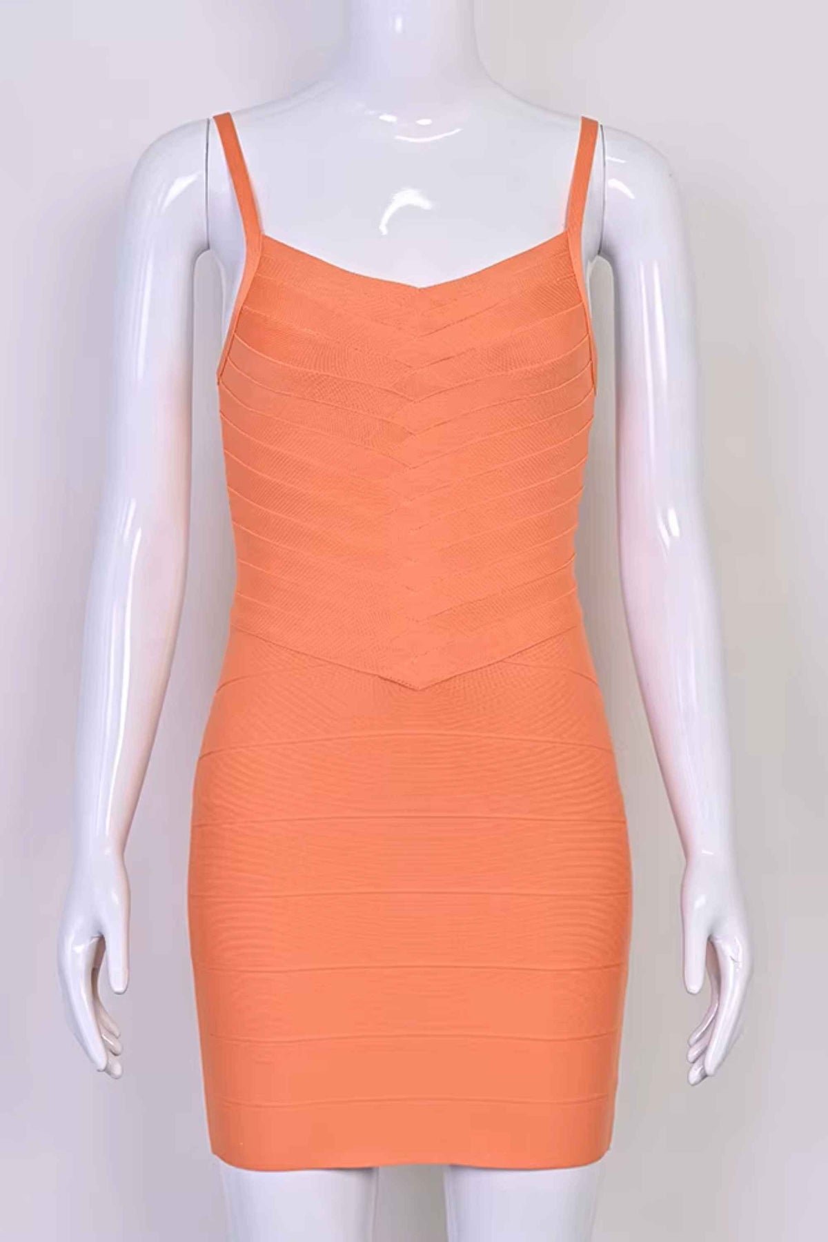 Woman wearing a figure flattering  Dom Bandage Mini Dress - Coral BODYCON COLLECTION Pty Ltd