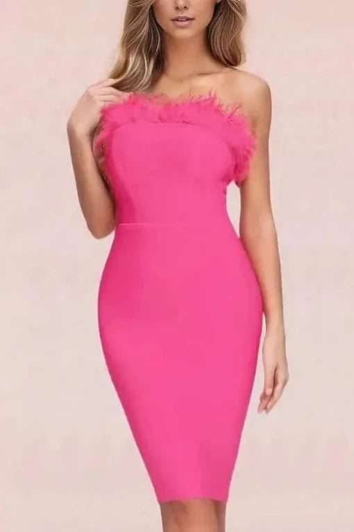 Woman wearing a figure flattering  Erin Bandage Dress - Hot Pink BODYCON COLLECTION