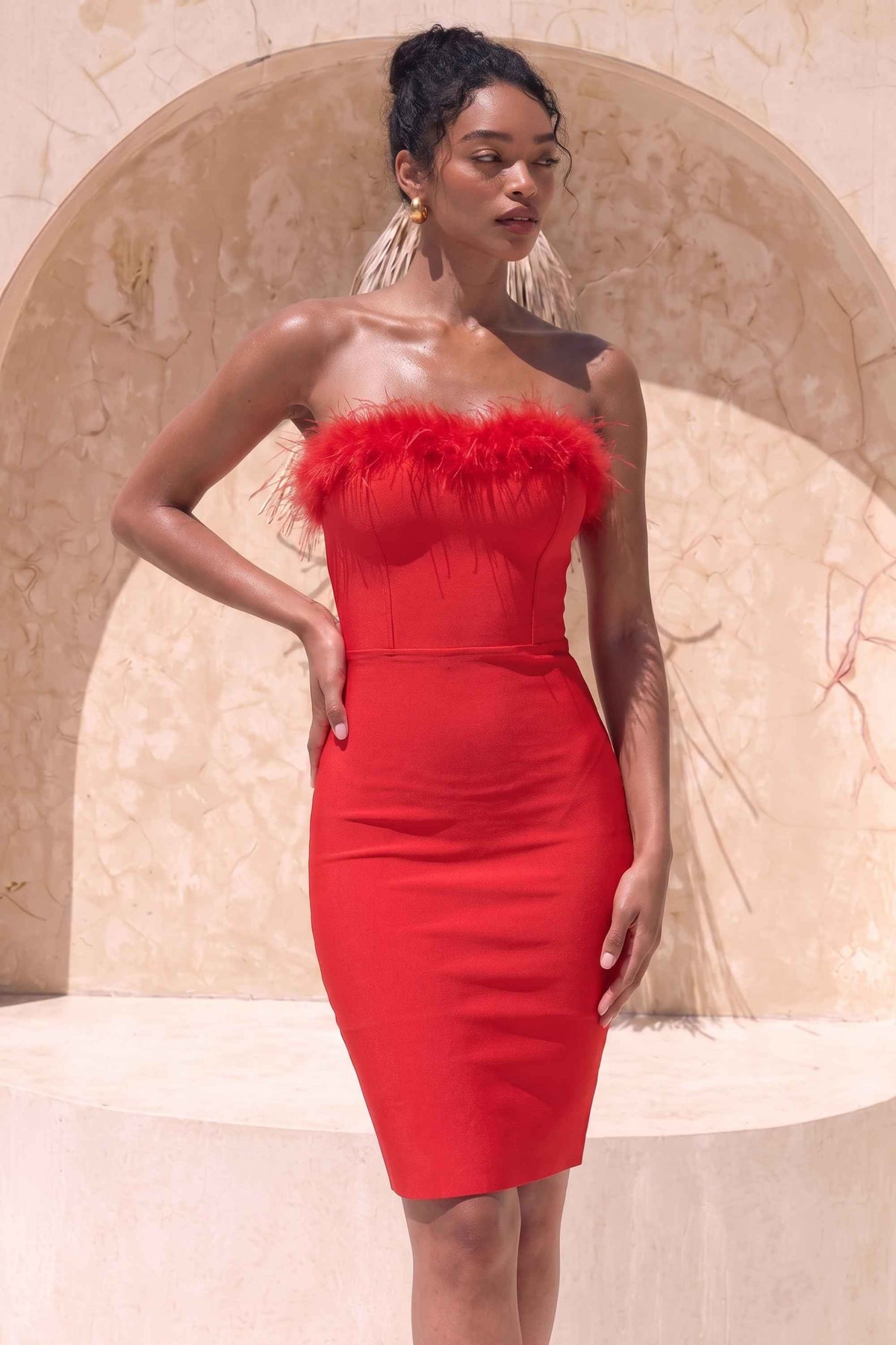 Woman wearing a figure flattering  Erin Bandage Dress - Lipstick Red BODYCON COLLECTION
