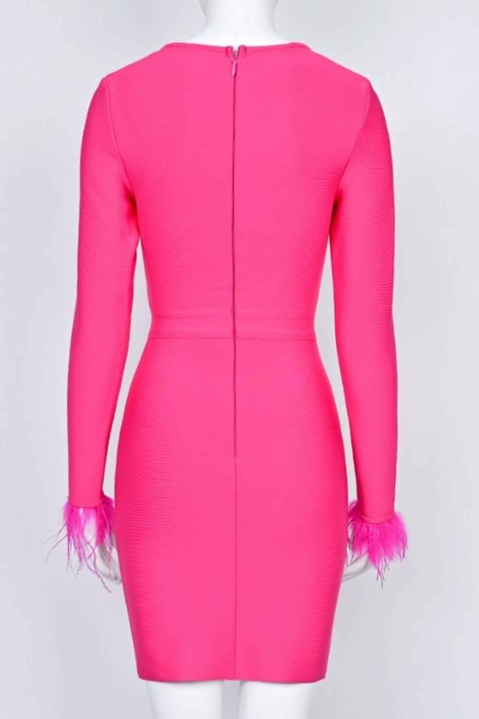 Woman wearing a figure flattering  Erin Long Sleeve Bandage Mini Dress - Hot Pink BODYCON COLLECTION