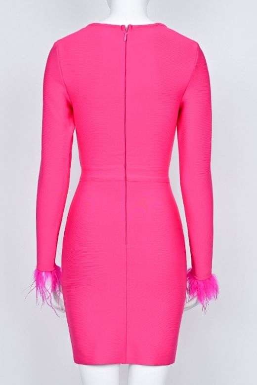 Woman wearing a figure flattering  Erin Long Sleeve Bandage Mini Dress - Hot Pink BODYCON COLLECTION