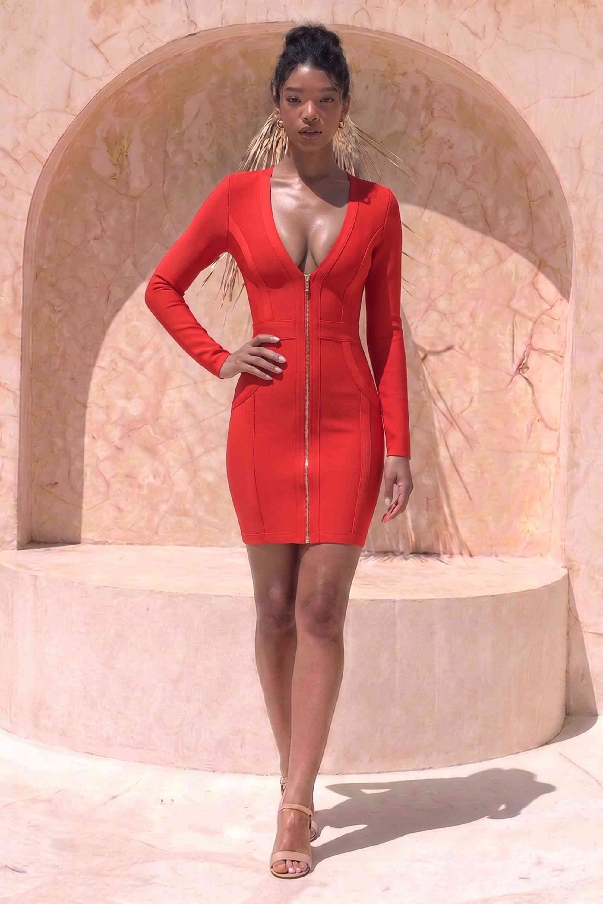 Woman wearing a figure flattering  Eva Long Sleeve Bandage Mini Dress - Lipstick Red BODYCON COLLECTION