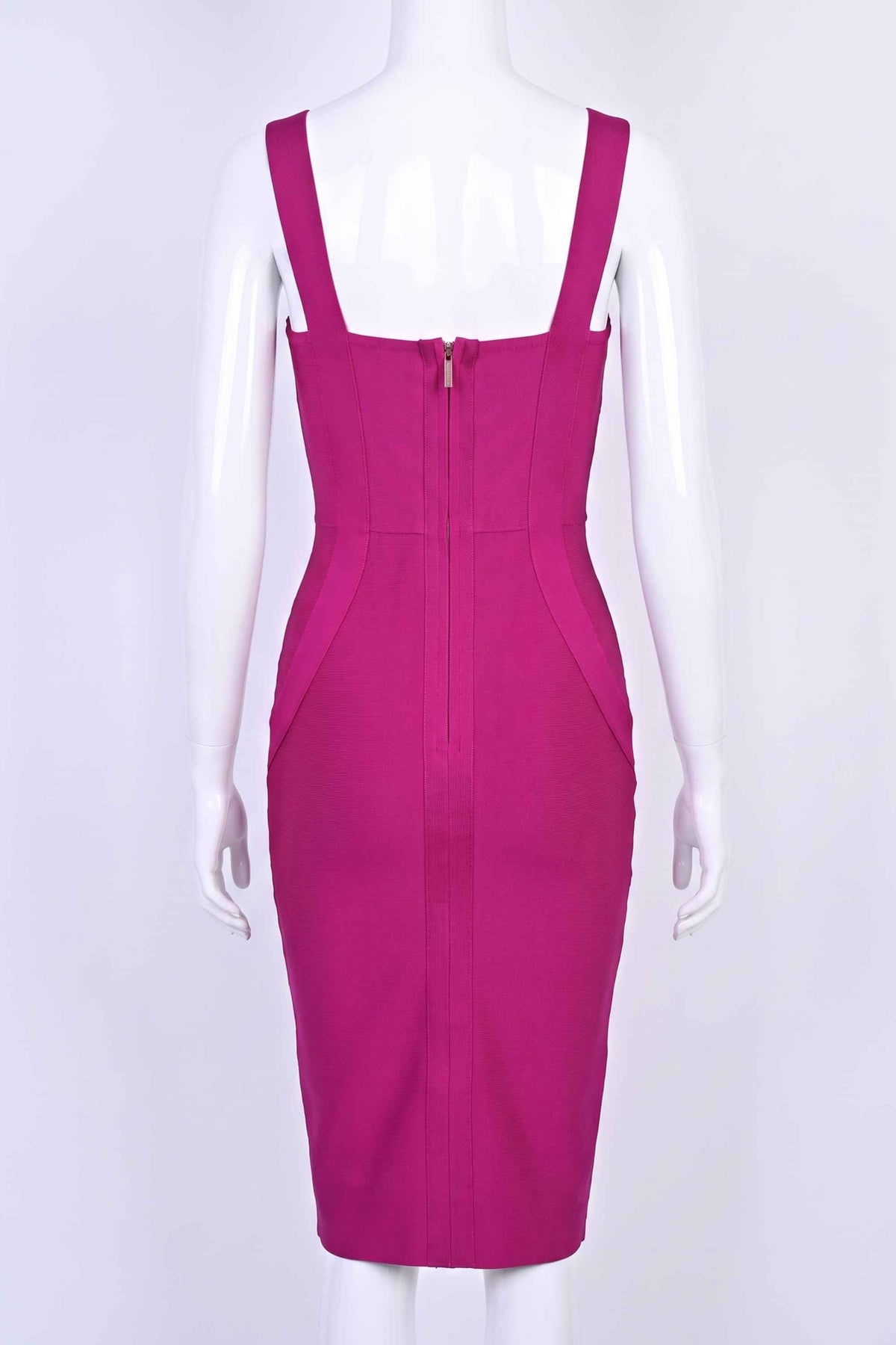 Woman wearing a figure flattering  Freya Bandage Dress - Magenta Pink BODYCON COLLECTION