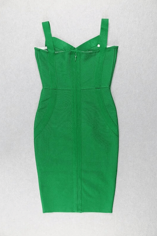 Woman wearing a figure flattering  Freya Bandage Midi Dress - Emerald Green BODYCON COLLECTION