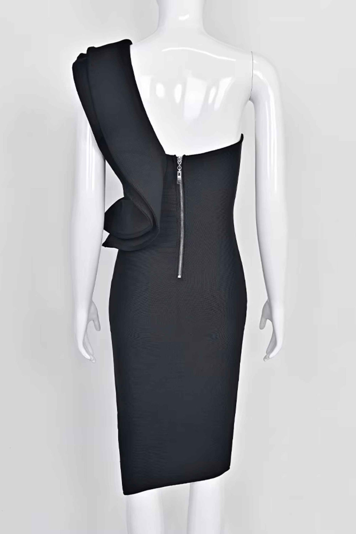 Woman wearing a figure flattering  Hayley Bodycon Dress - Classic Black Bodycon Collection