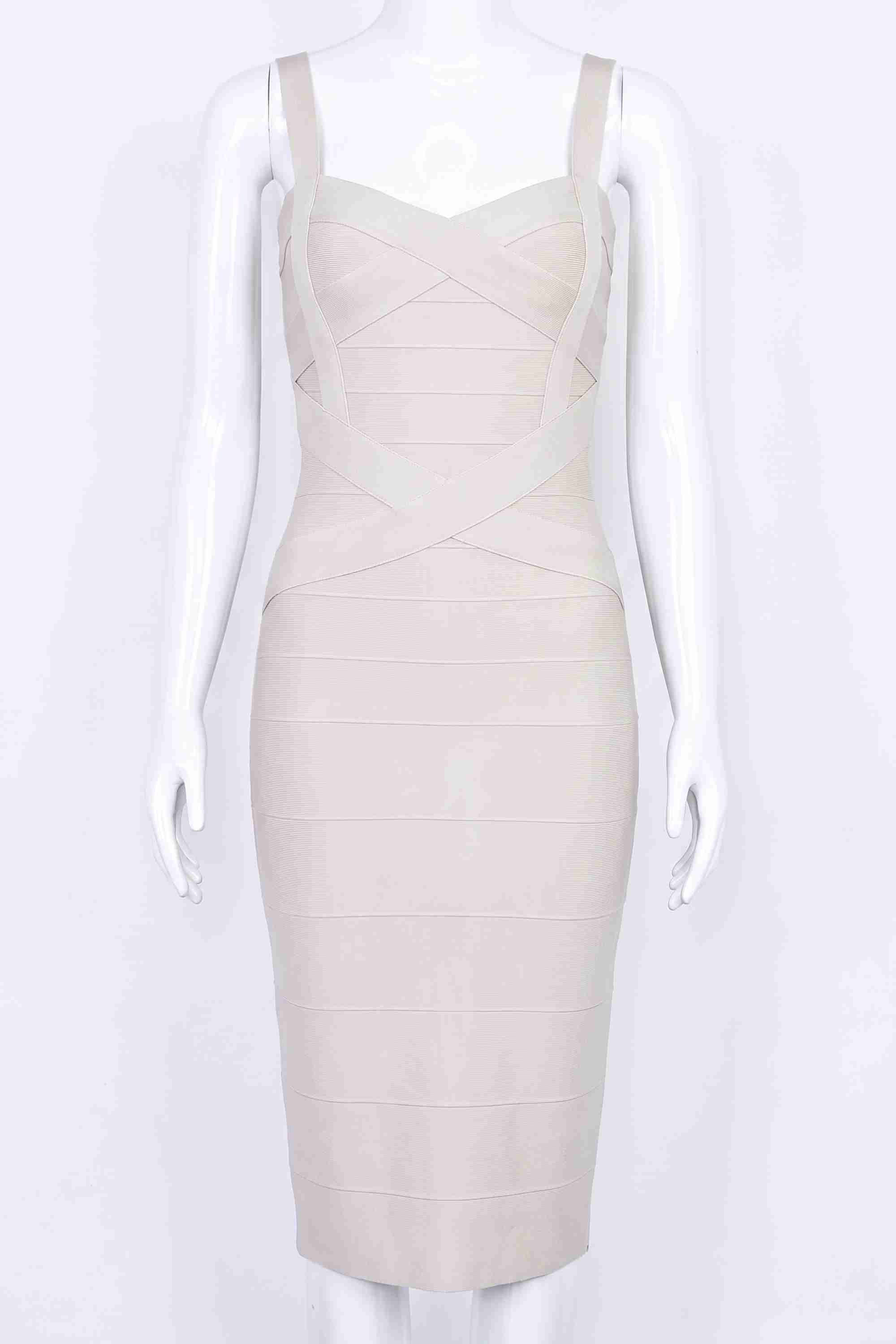 Woman wearing a figure flattering  Heidi Bandage Midi Dress - Cream Bodycon Collection