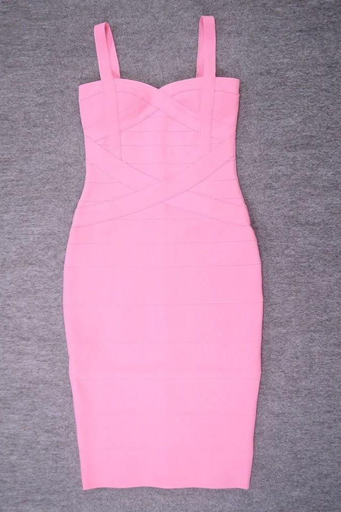 Woman wearing a figure flattering  Heidi Bandage Midi Dress - Dusty Pink Bodycon Collection