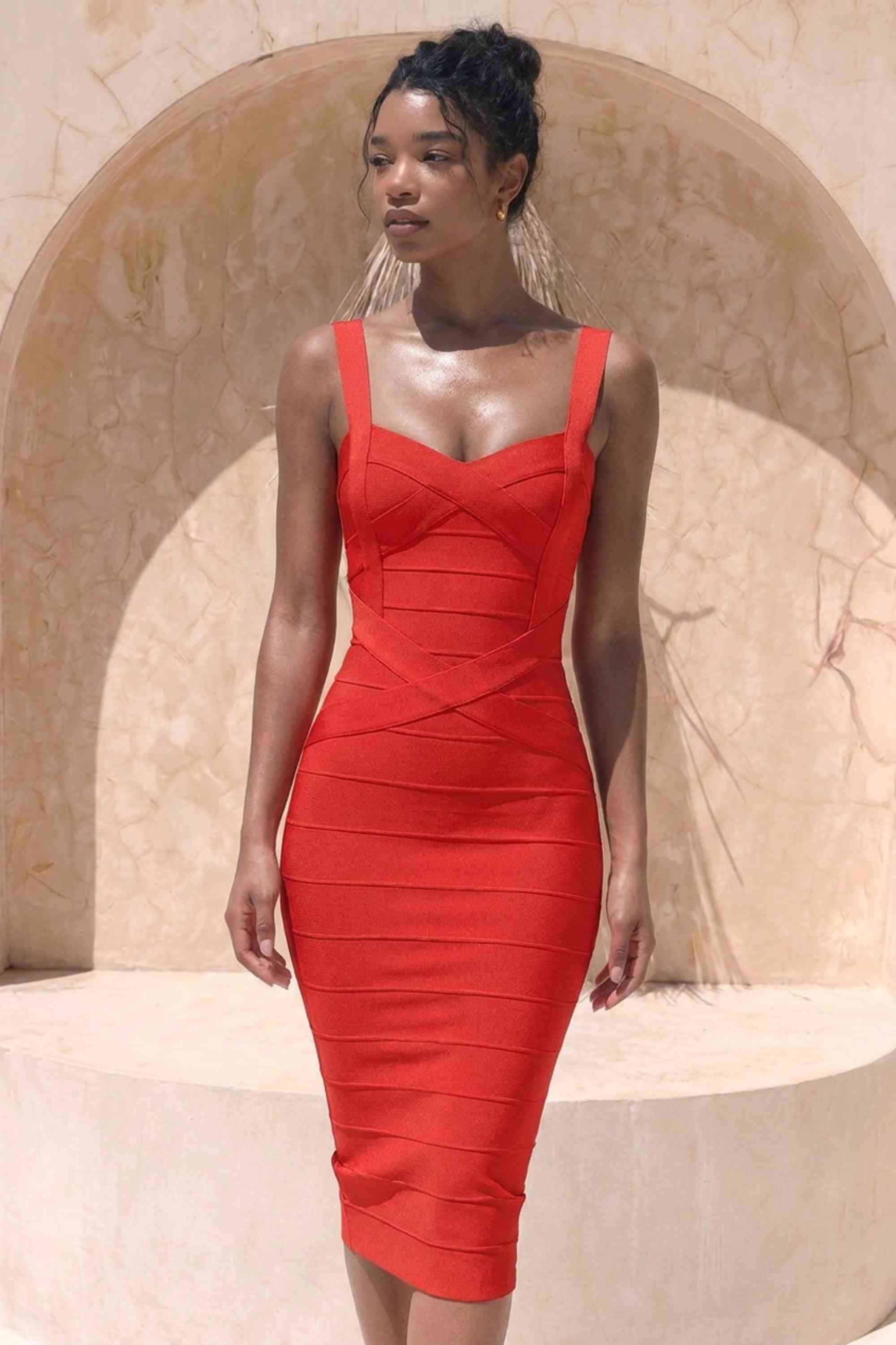Woman wearing a figure flattering  Heidi Bandage Midi Dress - Lipstick Red Bodycon Collection