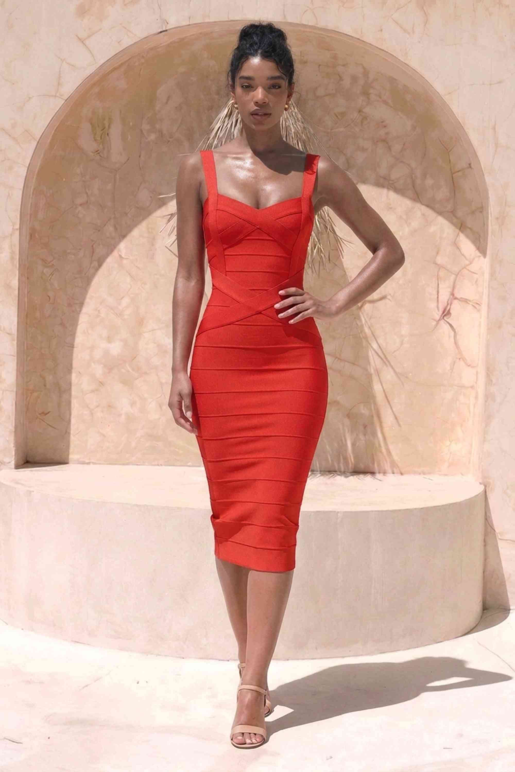 Woman wearing a figure flattering  Heidi Bandage Midi Dress - Lipstick Red Bodycon Collection