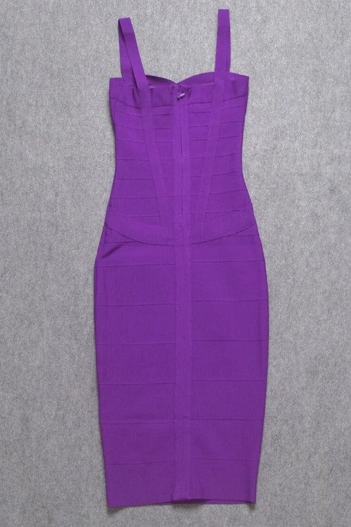 Woman wearing a figure flattering  Heidi Bandage Midi Dress - Plum Purple Bodycon Collection