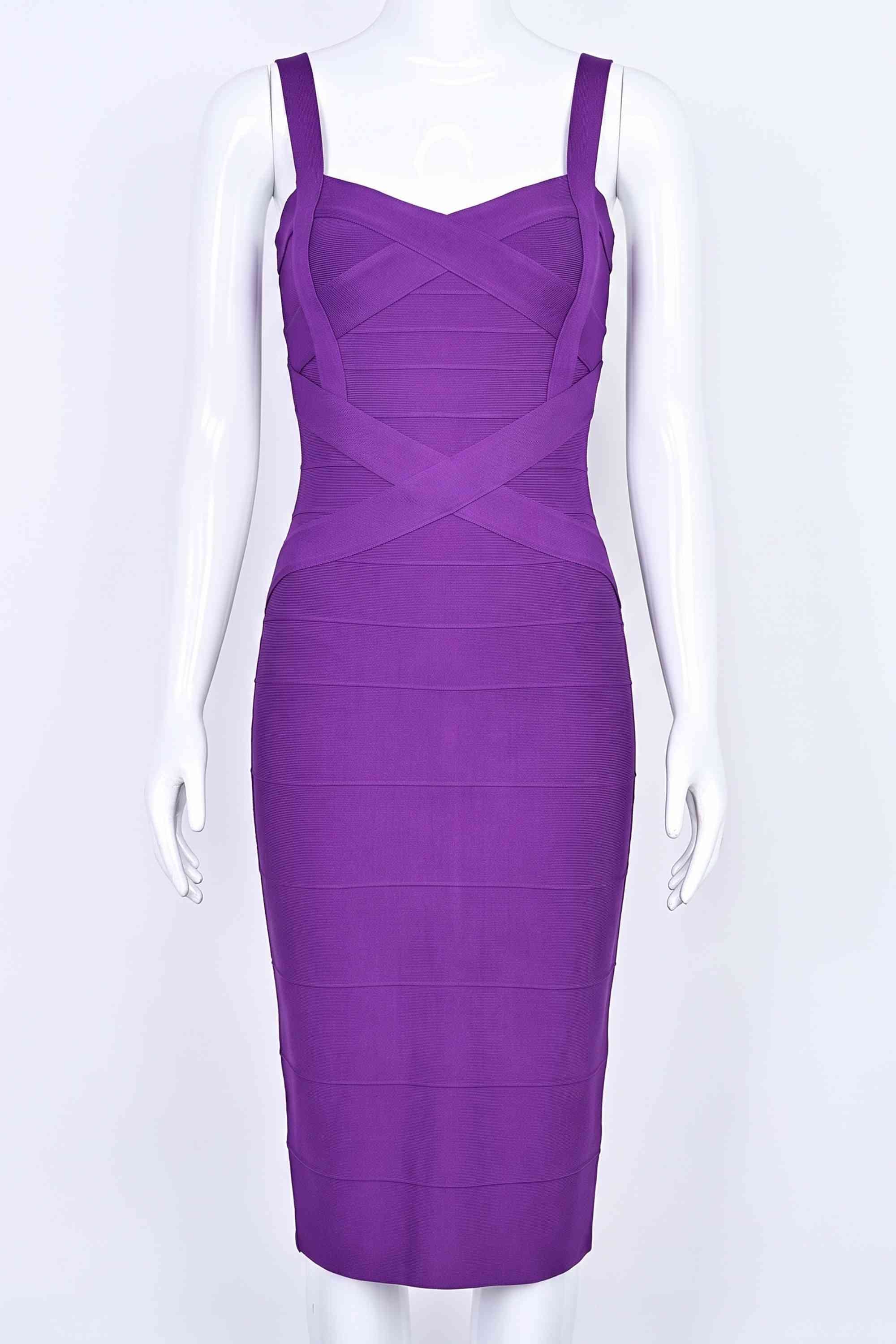 Woman wearing a figure flattering  Heidi Bandage Midi Dress - Plum Purple Bodycon Collection