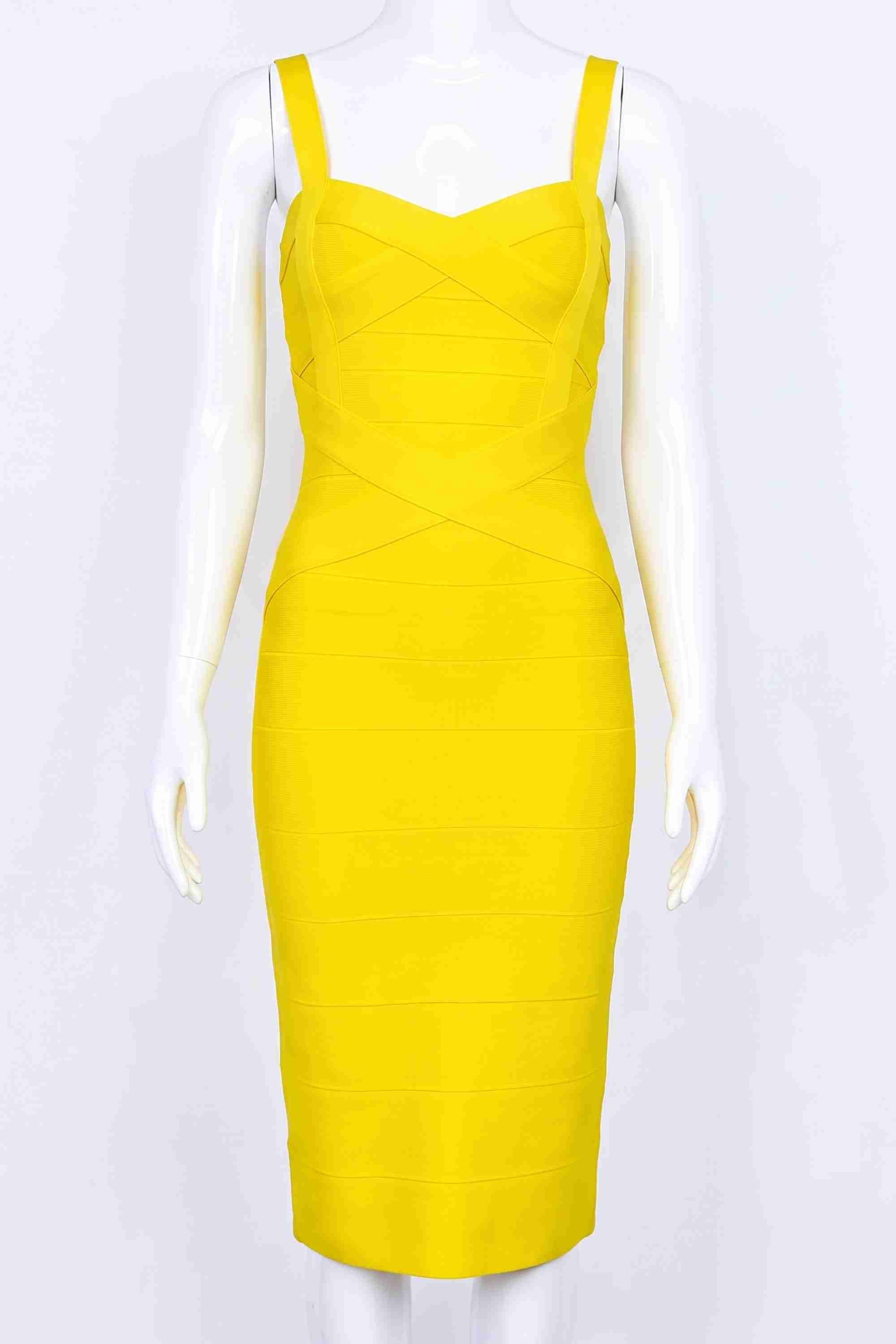 Woman wearing a figure flattering  Heidi Bandage Midi Dress - Sun Yellow Bodycon Collection
