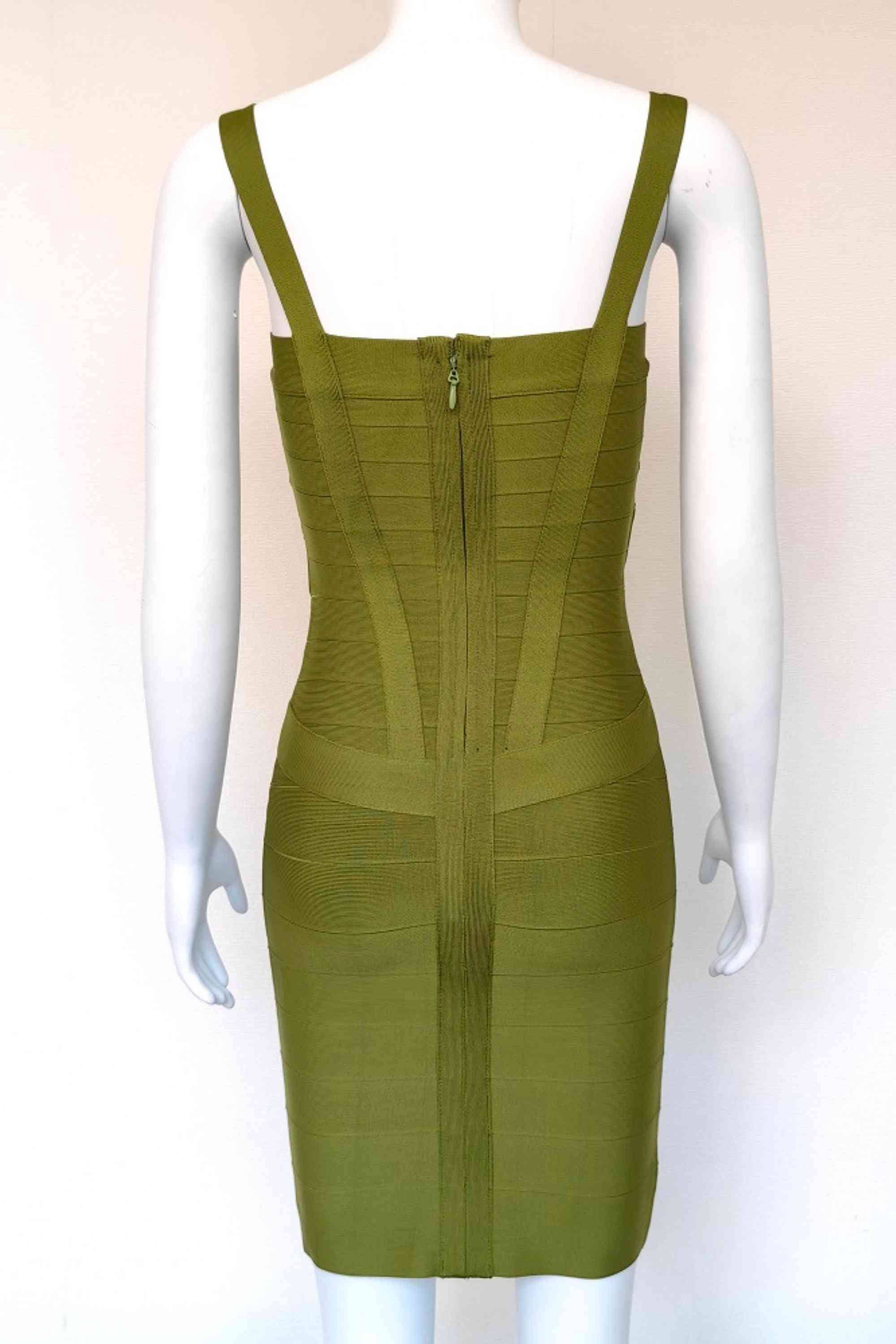 Woman wearing a figure flattering  Heidi Bandage Mini Dress - Army Green Bodycon Collection
