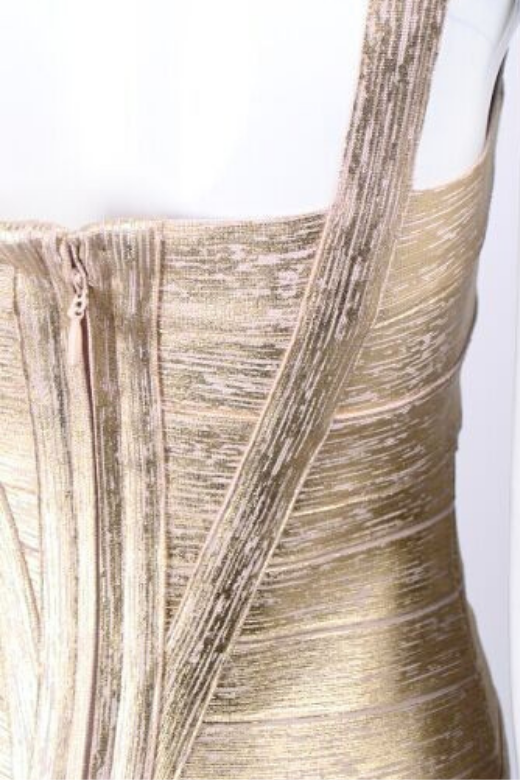 Woman wearing a figure flattering  Heidi Bandage Mini Dress - Gold Bodycon Collection