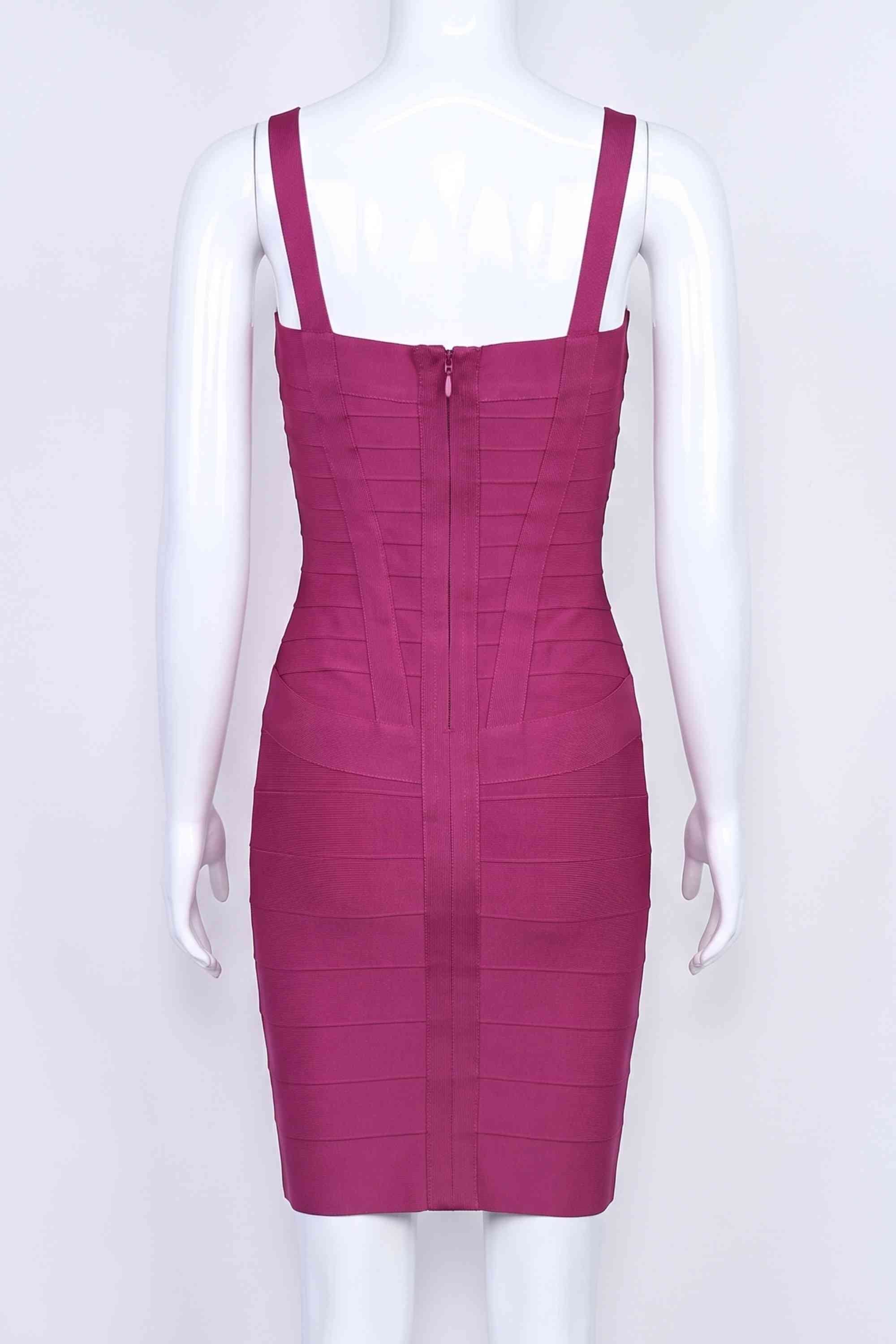 Woman wearing a figure flattering  Heidi Bandage Mini Dress - Magenta Pink Bodycon Collection