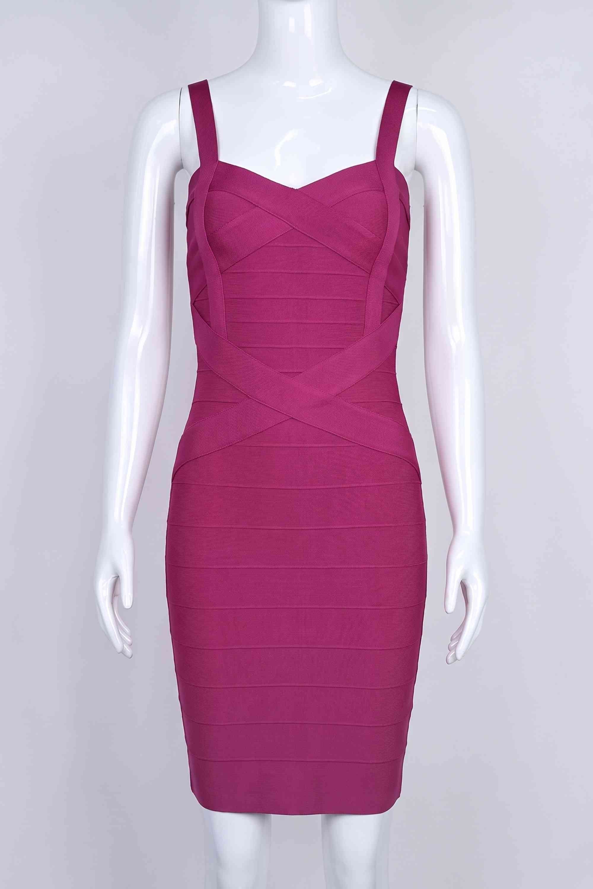 Woman wearing a figure flattering  Heidi Bandage Mini Dress - Magenta Pink Bodycon Collection