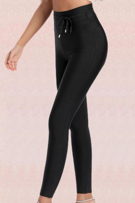 Woman wearing a figure flattering  High Waist Bandage Jumpsuit Pant - Classic Black BODYCON COLLECTION