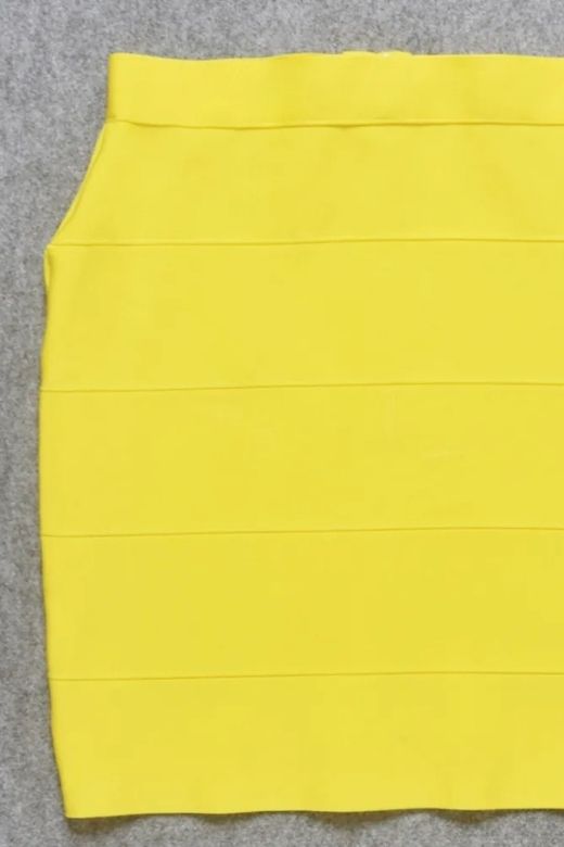 Woman wearing a figure flattering  High Waist Bandage Mini Skirt - Sun Yellow BODYCON COLLECTION