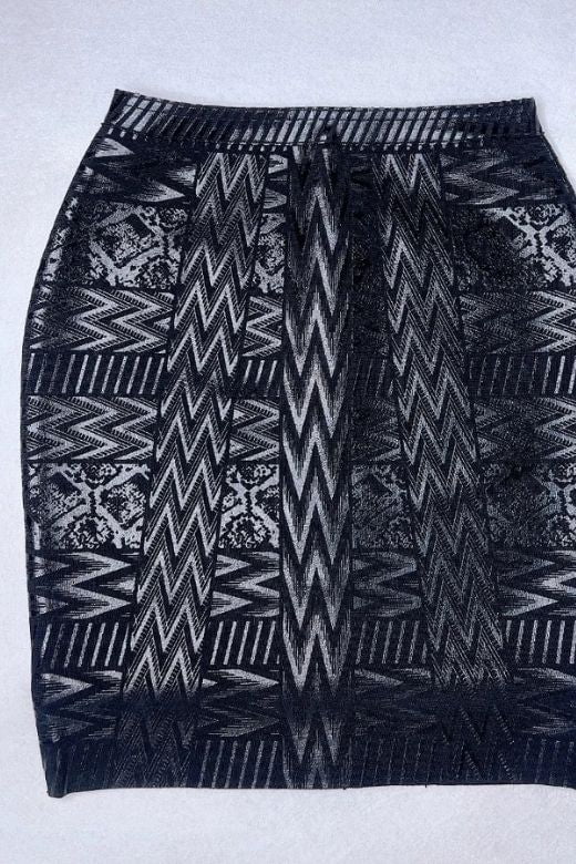 Woman wearing a figure flattering  High Waist Metallic Mini Skirt - Classic Black BODYCON COLLECTION