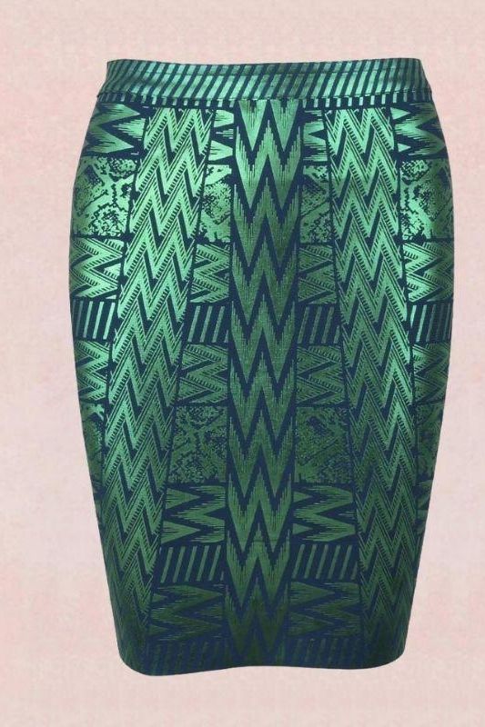 Woman wearing a figure flattering  High Waist Metallic Mini Skirt - Emerald Green BODYCON COLLECTION