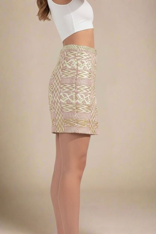 Woman wearing a figure flattering  High Waist Metallic Mini Skirt - Gold BODYCON COLLECTION