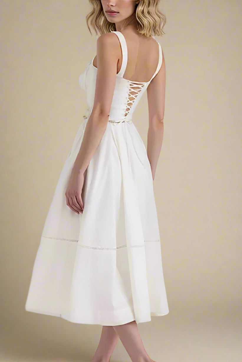 Woman wearing a figure flattering  Holland Top and Midi Skirt Set - White Pearl BODYCON COLLECTION Pty Ltd