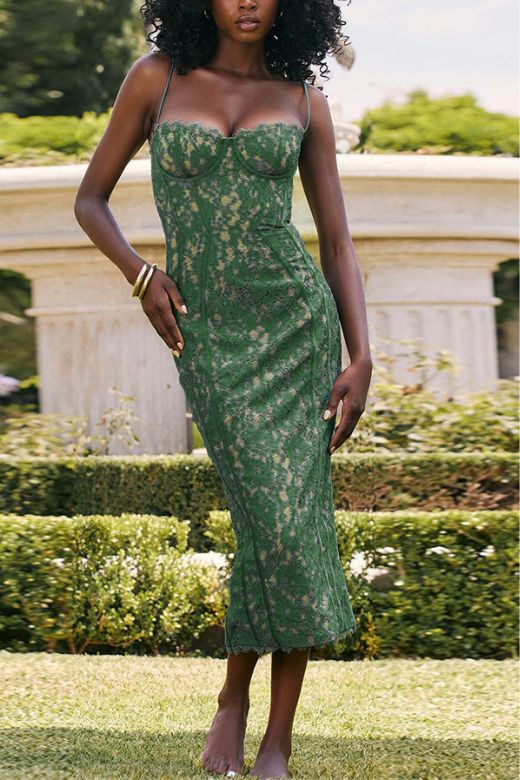 Woman wearing a figure flattering  Honor Bodycon Midi Dress - Emerald Green BODYCON COLLECTION