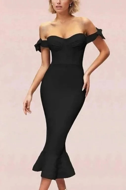 Woman wearing a figure flattering  Hunter Bandage Midi Dress - Classic Black BODYCON COLLECTION