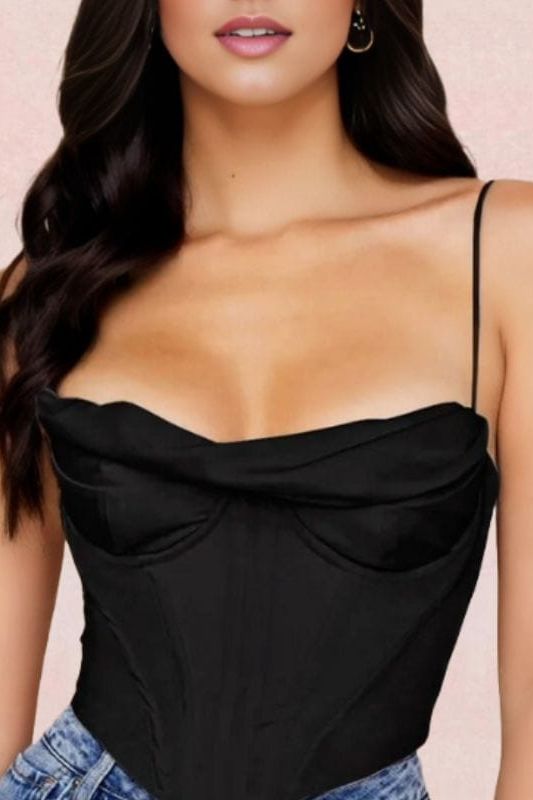 Woman wearing a figure flattering  Indi Corset Crop Top - Classic Black BODYCON COLLECTION