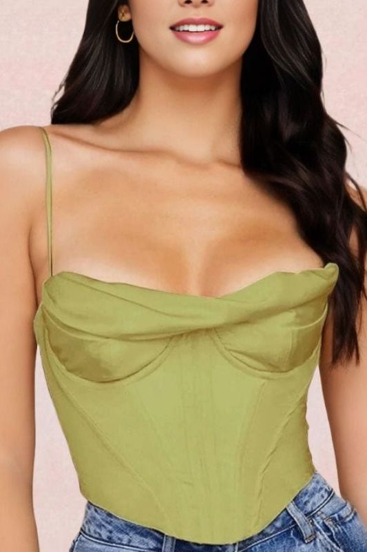 Woman wearing a figure flattering  Indi Corset Crop Top - Olive Green BODYCON COLLECTION