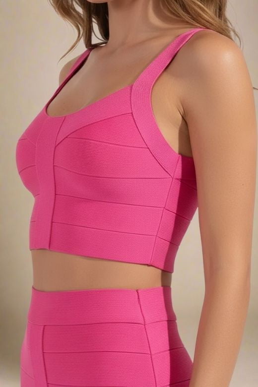 Woman wearing a figure flattering  India Bandage Top and Mini Skirt Outfit Set - Hot Pink BODYCON COLLECTION